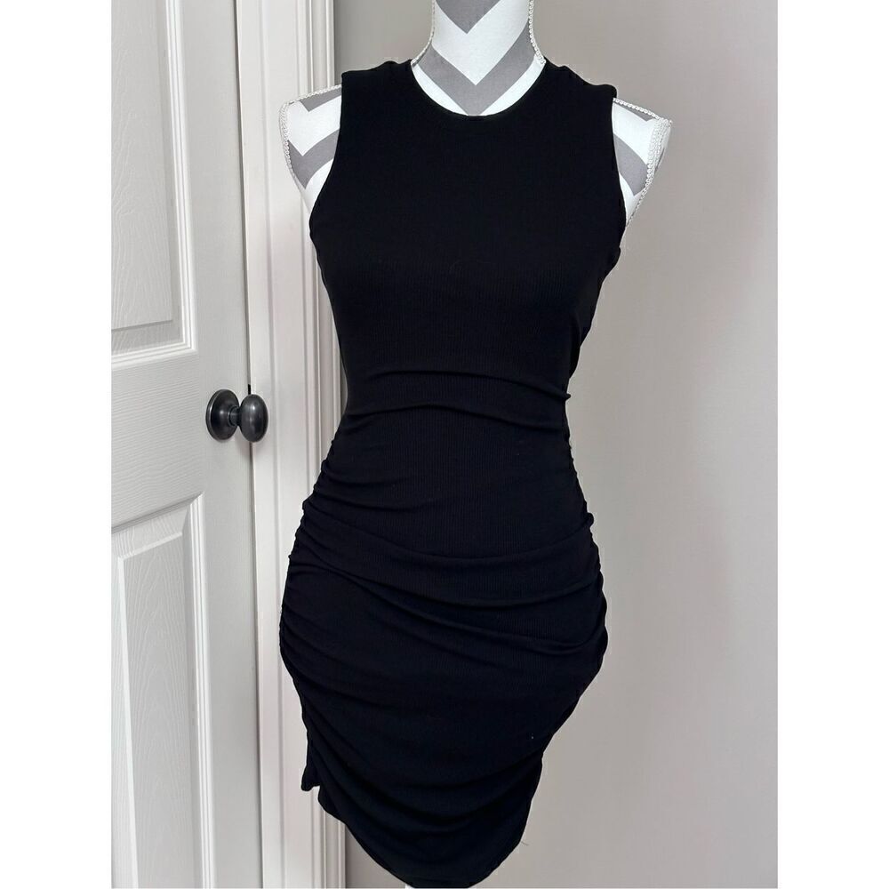 Lyn Burches stretchy black dress.